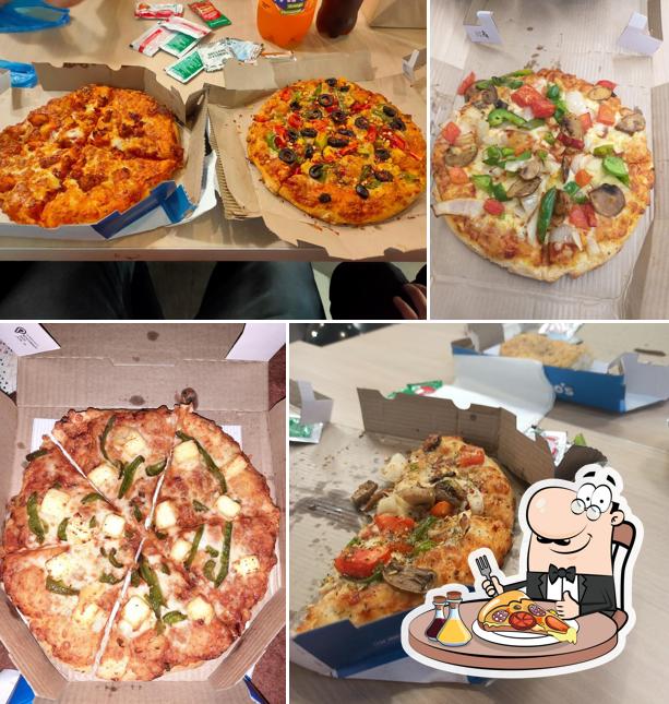 Pick pizza at Domino's Pizza R. J. Puram, Gwalior