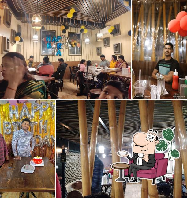 Take a seat at one of the tables at Krishna Bakers & Ice Cream Parlour