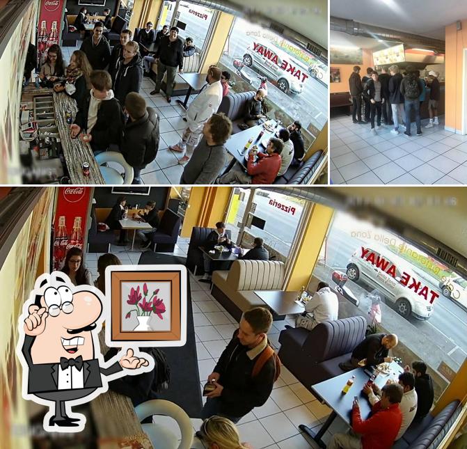 Siediti a un tavolo di Pizzeria Della Zona