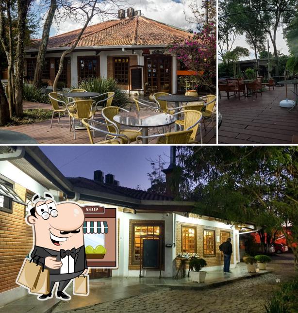 Você pode espairecer no na área externa do Happy Burger & Restaurante