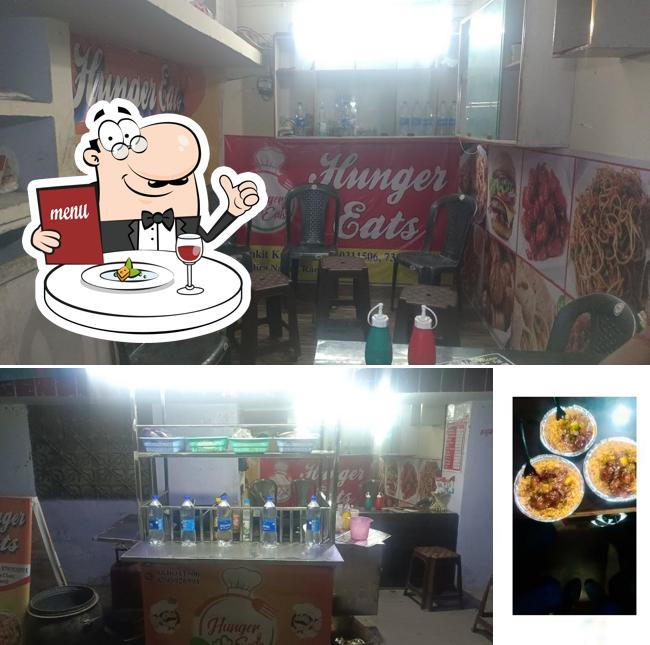 This is the image showing food and interior at Hunger Eats fast food restaurants