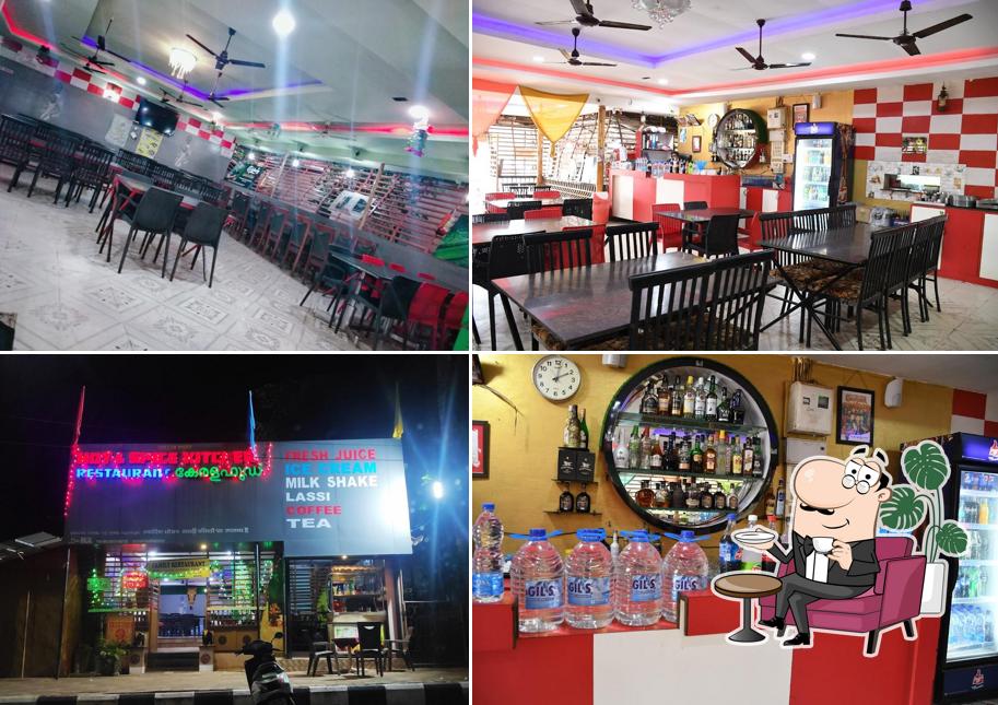 Take a seat at one of the tables at Hot And Spice Kitchen