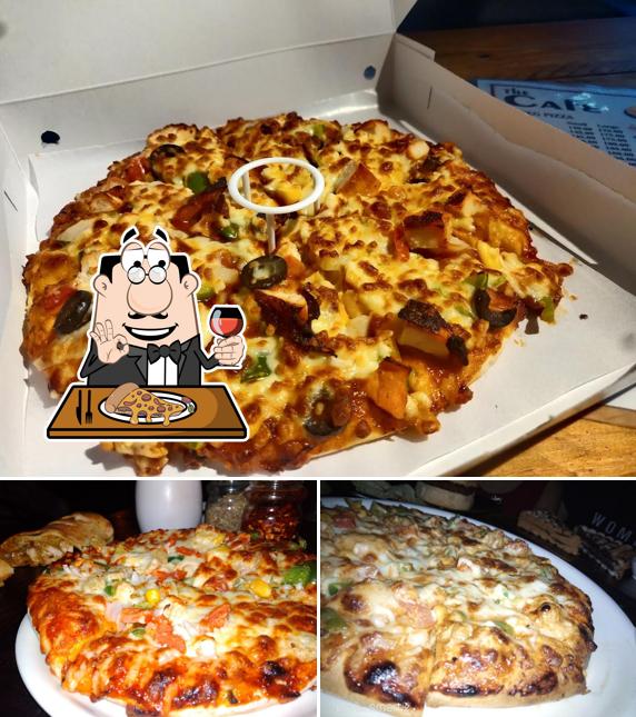 At THE CAFE & ROOFTOP -Continental Cafe In Bhandara, you can taste pizza