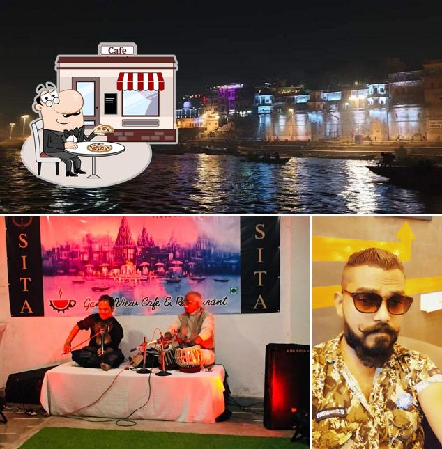 You can get some fresh air outside Ganga View Cafe & Restaurant