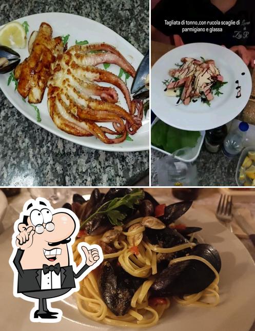Questa è la immagine che raffigura la interni e cibo di La Locanda Di Zio Rocco