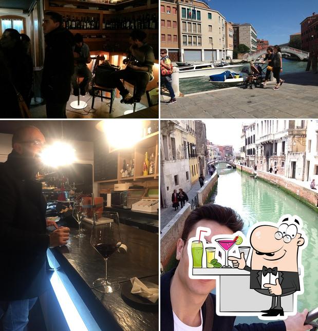 Guarda la immagine che mostra la bancone da bar e esterno di Vinus