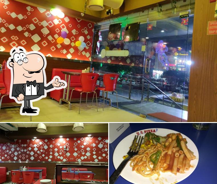 The picture of interior and food at uspizza morbi