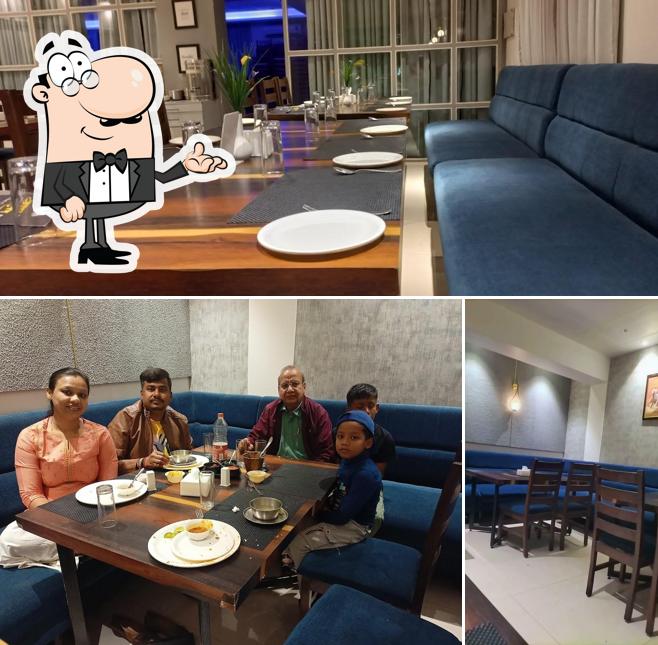 Take a seat at one of the tables at Amantran