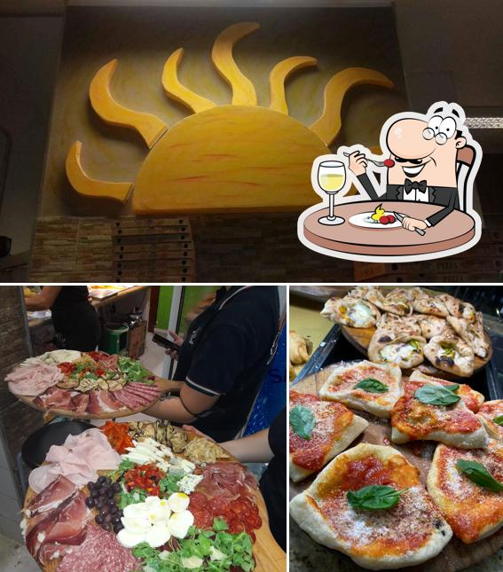 Questa è la foto che presenta la cibo e esterno di Pizzeria Già la Pizza