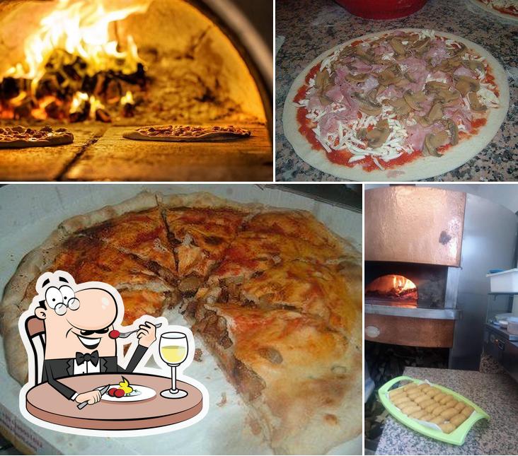 La immagine di cibo e interni da Pizzeria D'AsportoMAYA PAPA