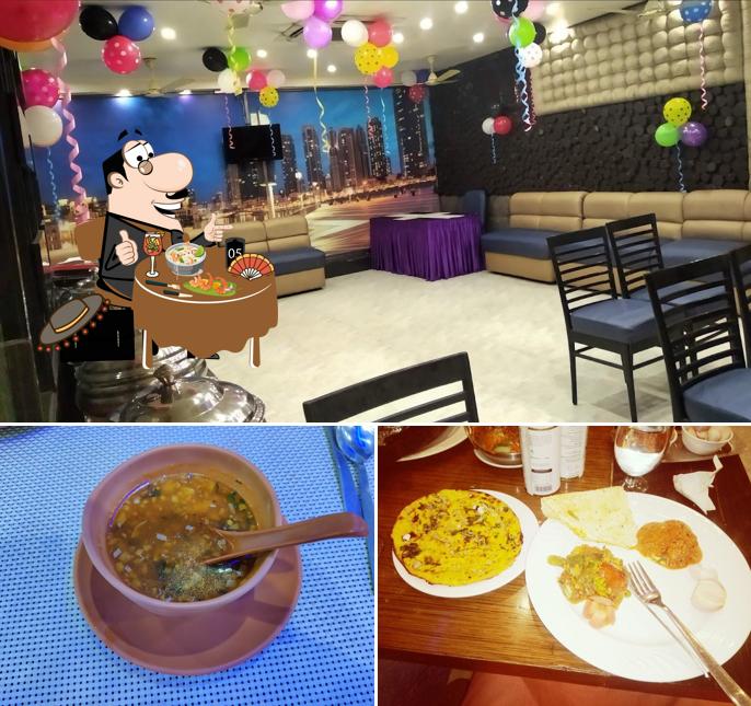 Check out the photo depicting food and interior at Gulmohur Restaurant