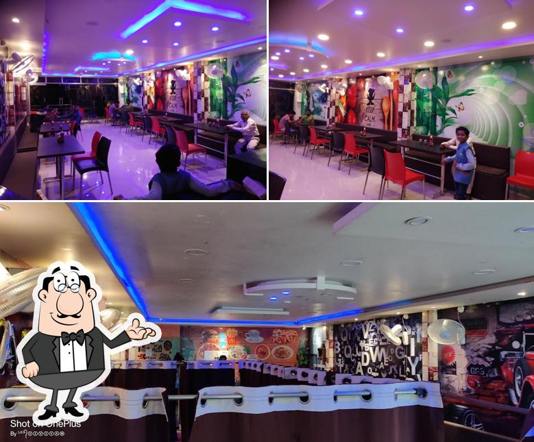 Take a seat at one of the tables at Mr.Pizza & Cafe