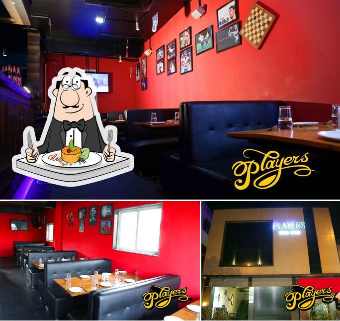 Check out the image displaying food and interior at Players Lounge