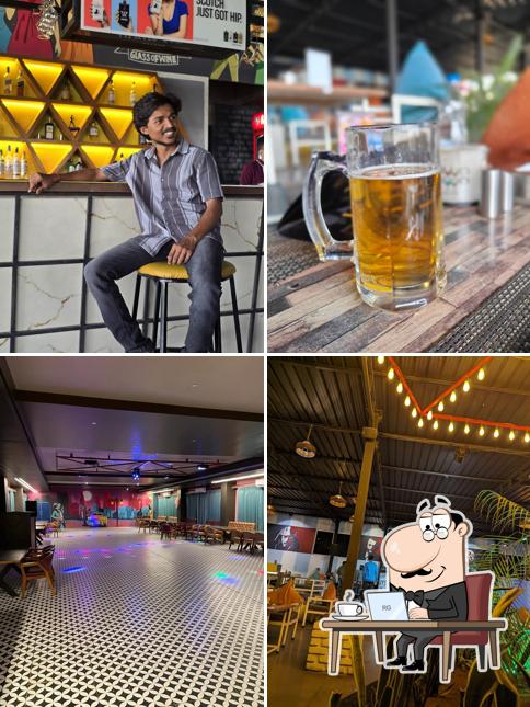 Take a seat at one of the tables at DownTown - All Day Dine & Bar