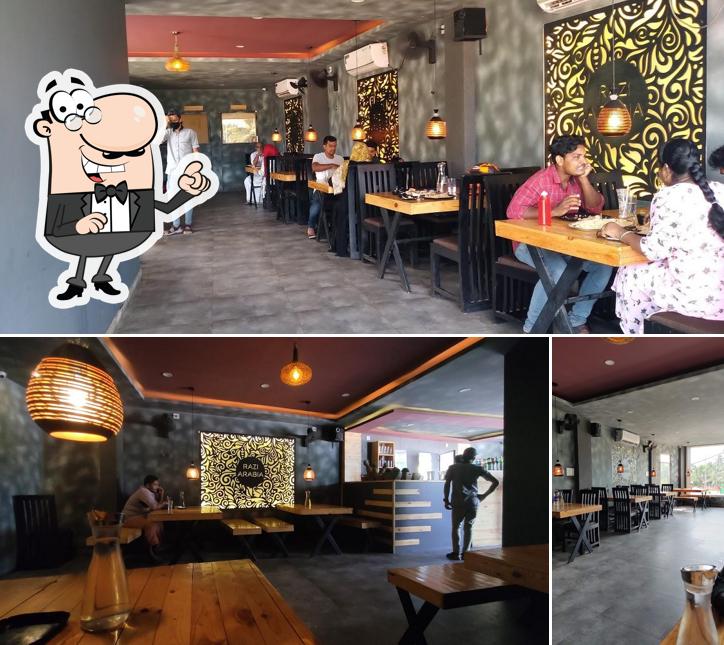 Take a seat at one of the tables at Razi Arabia