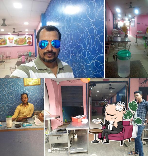 The interior of Ambur Royal Biryani And Fastfood