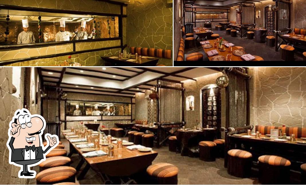 Take a seat at one of the tables at PESHAWRI