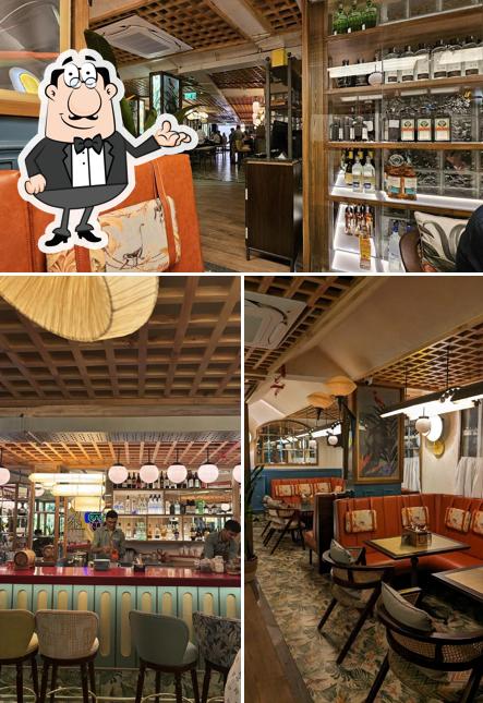 Take a seat at one of the tables at Monkey Bar