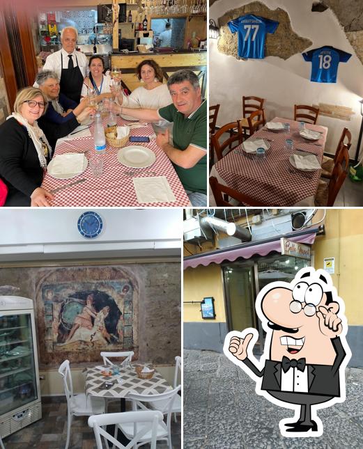 Dai un'occhiata agli interni di Trattoria Pizzeria Bella Napoli Centro - Chef dal 1990