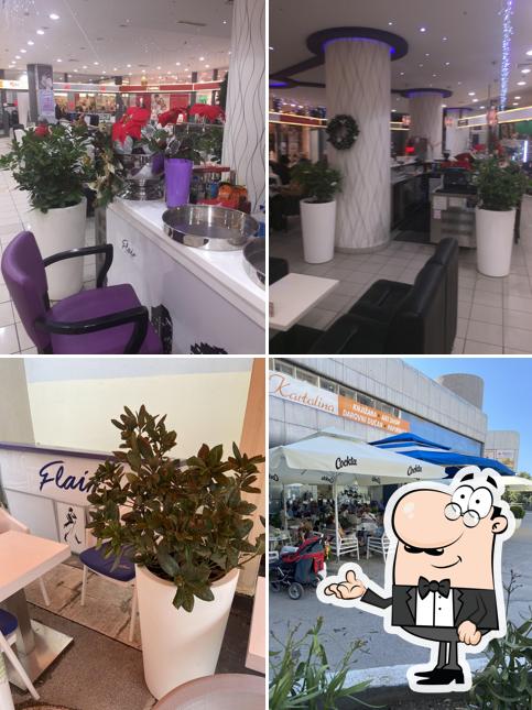 Siediti a un tavolo di Cafe bar Flair