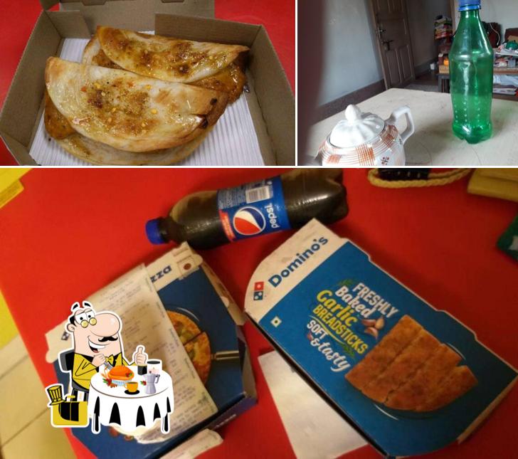 This is the photo showing food and beer at Domino's Pizza South 24, Parganas