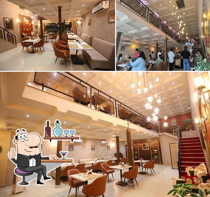 Take a seat at one of the tables at Manara - The Highway Karahi