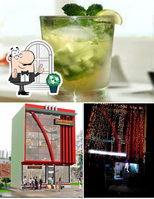 The photo of exterior and beverage at FIRE 'N' GRILL