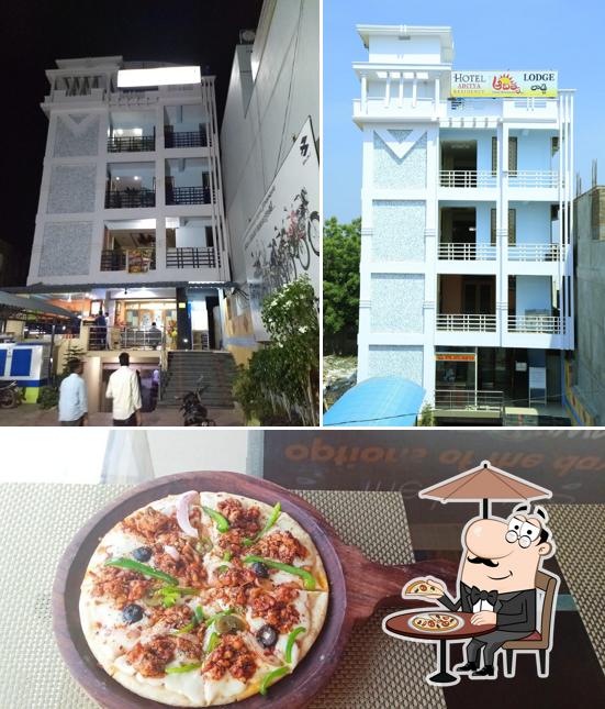 The image of exterior and pizza at Hotel Aditya Grand