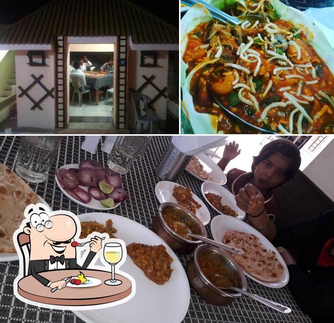 Check out the photo displaying food and interior at Rasvatika Restaurant