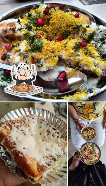 Try out pizza at Mathurawashi Chat Center