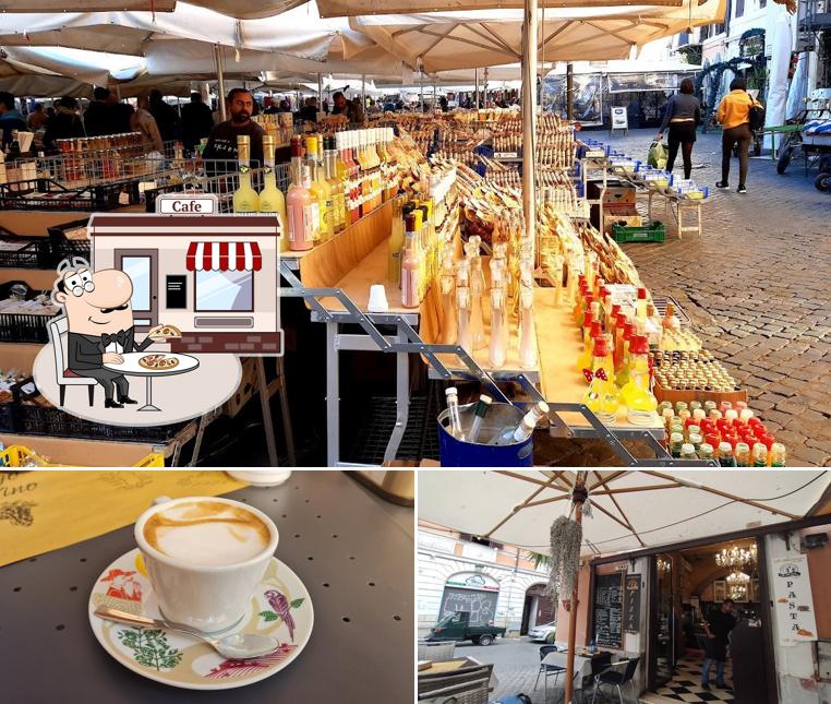 Curiosa tra l'area esterna di Al Biscione Cafė 1965 - CIBO e VINI