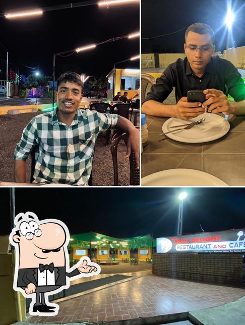 Take a look at the photo showing interior and exterior at THE BHUJ DELIGHT RESTAURANT AND CAFE