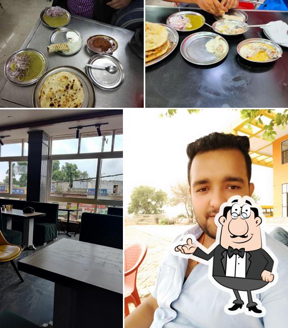 Take a seat at one of the tables at Al-kareem chicken corner