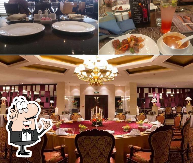 Take a seat at one of the tables at Pinch Of Spice