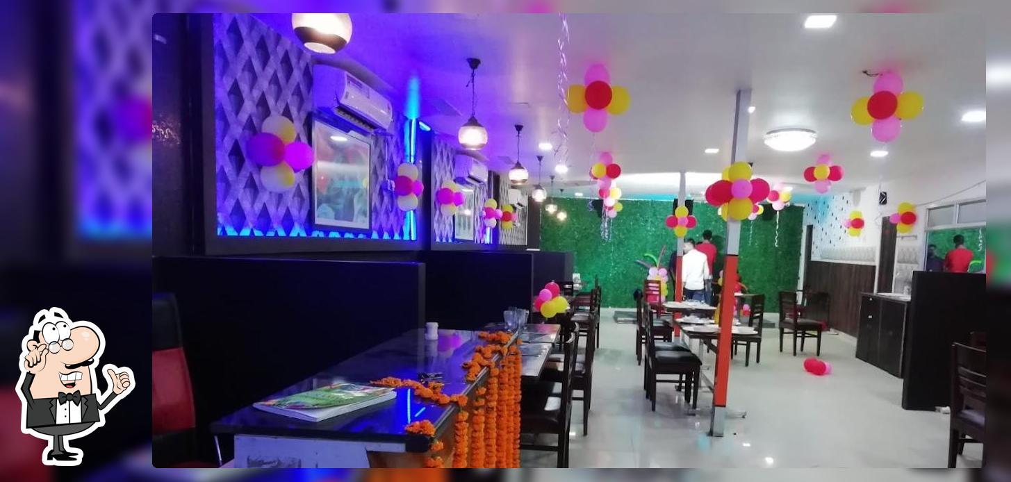 Take a seat at one of the tables at Tasty Food Boutique