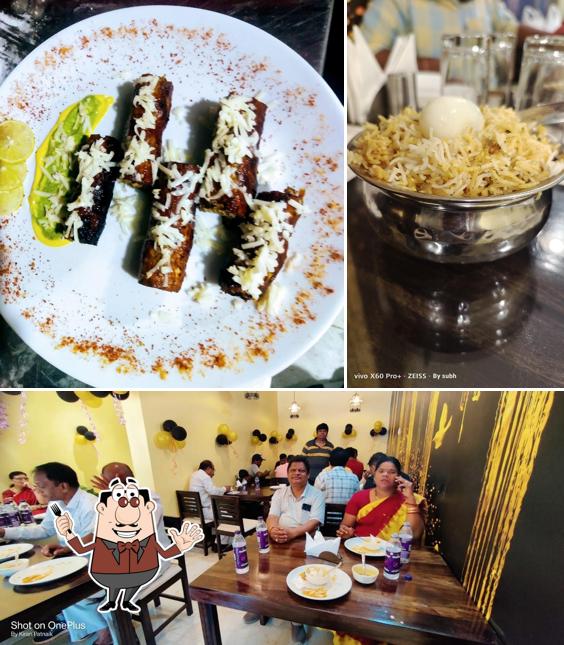 Among different things one can find food and interior at Gold star AC Restaurant
