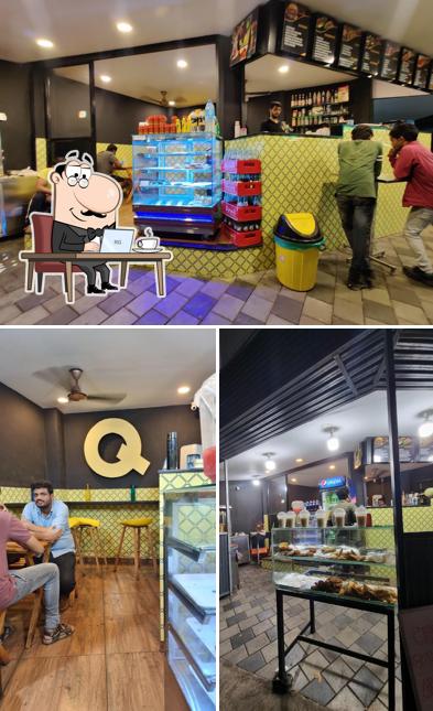Take a seat at one of the tables at Qcafe