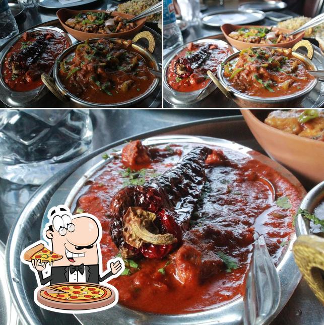 Try out pizza at Parvati Bar And Restaurant