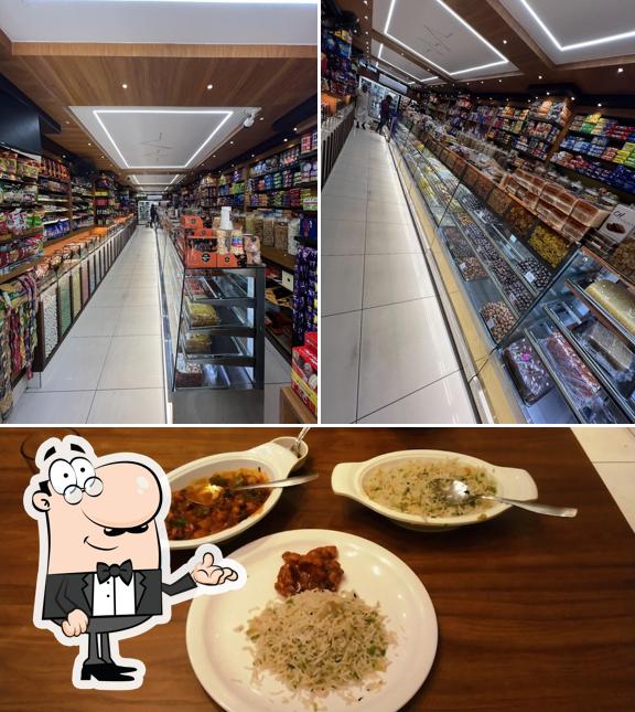 Among various things one can find interior and food at SWEET HOME RESTAURANT, MANJERI