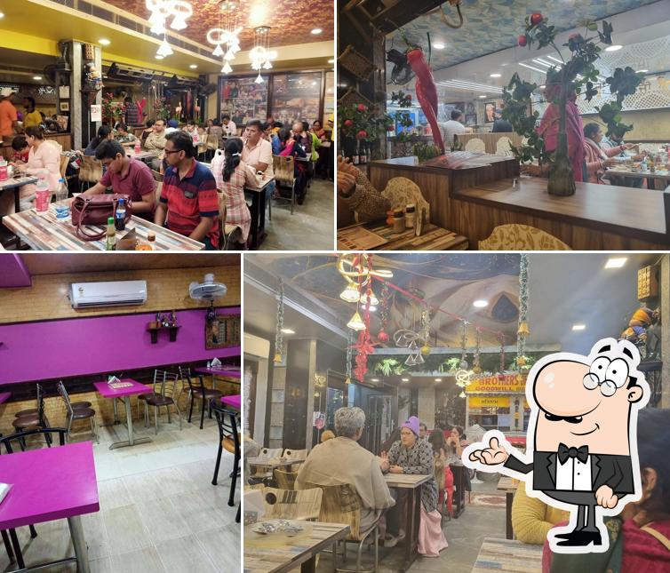 Take a seat at one of the tables at Brothers Dhaba