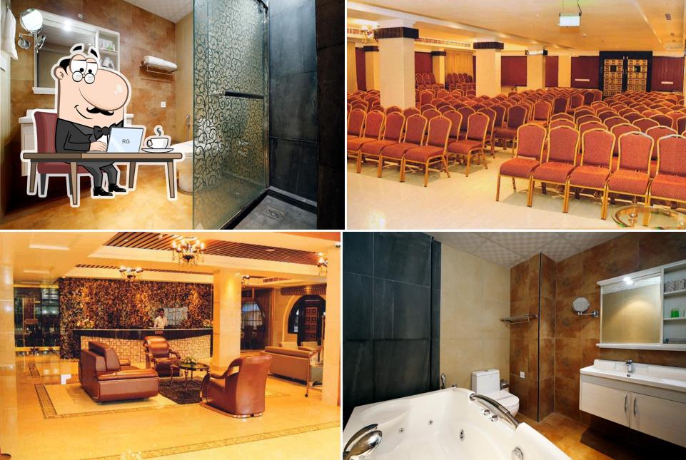 Take a seat at one of the tables at HOTEL PARK RESIDENCY