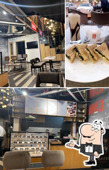 Take a seat at one of the tables at Barista