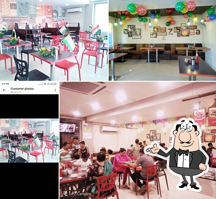 Check out how PIZZA ZONE, KALOL looks inside