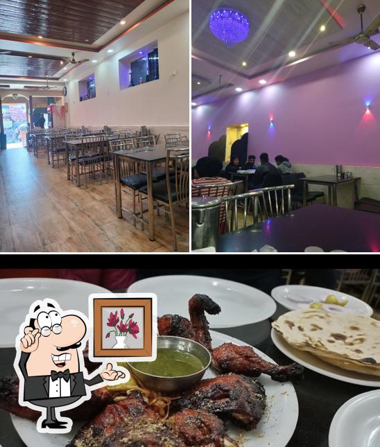 Take a seat at one of the tables at Sagar Restaurant