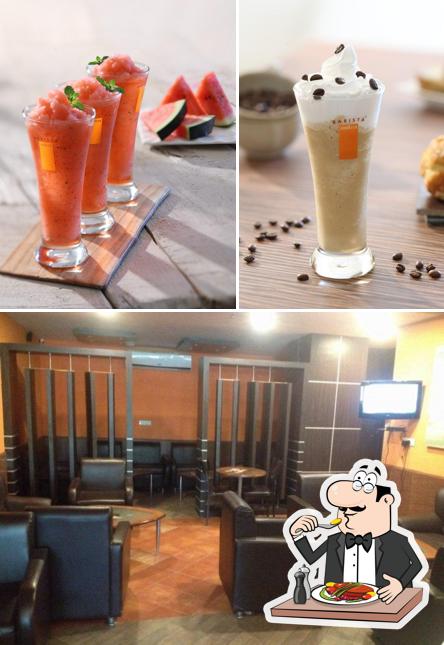 Take a look at the image displaying food and interior at Barista Lavazza