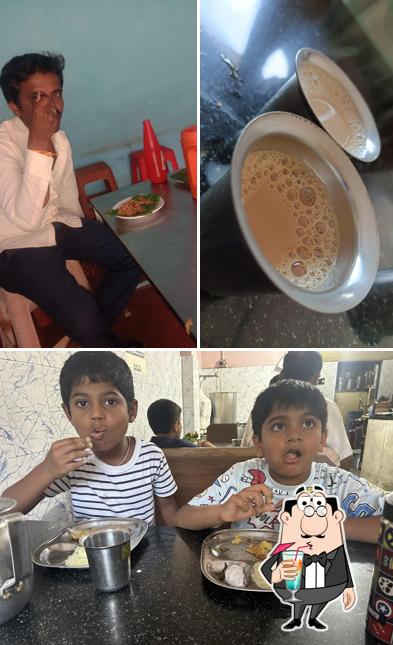 This is the photo depicting drink and interior at Durga Cafe