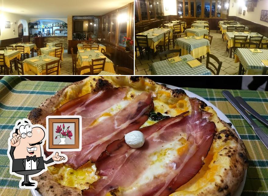 Dai un’occhiata alla foto che raffigura la interni e cibo di L'angolo del Silenzio Pizzeria