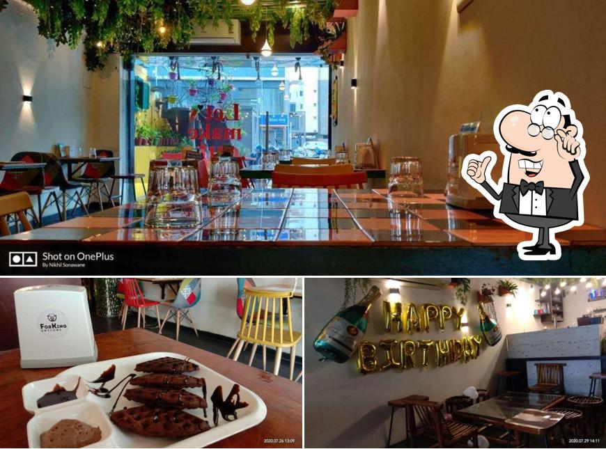 Take a seat at one of the tables at FORKING AWESOME
