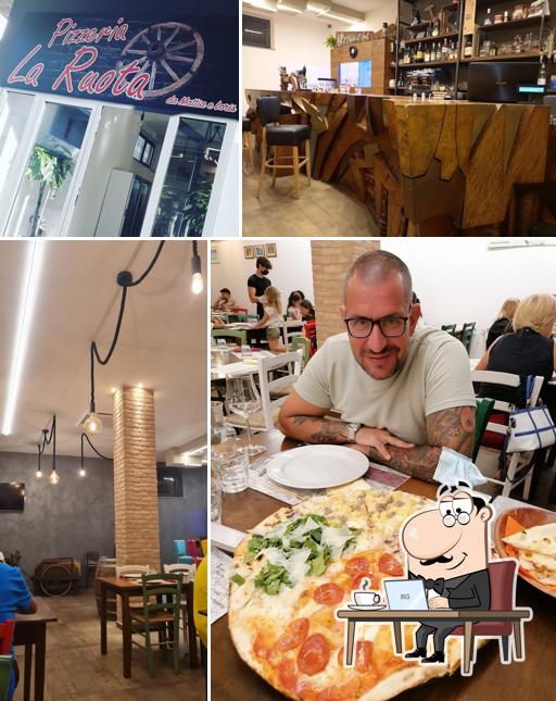 Dai un'occhiata agli interni di Pizzeria La Ruota di Mattia & Loris