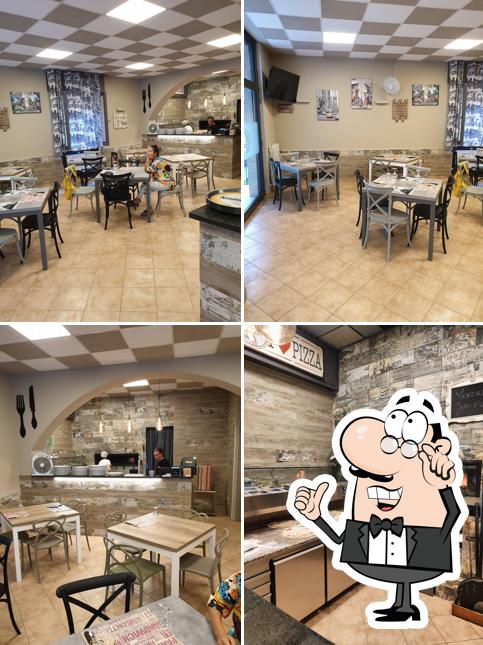 Gli interni di Happy Pizza